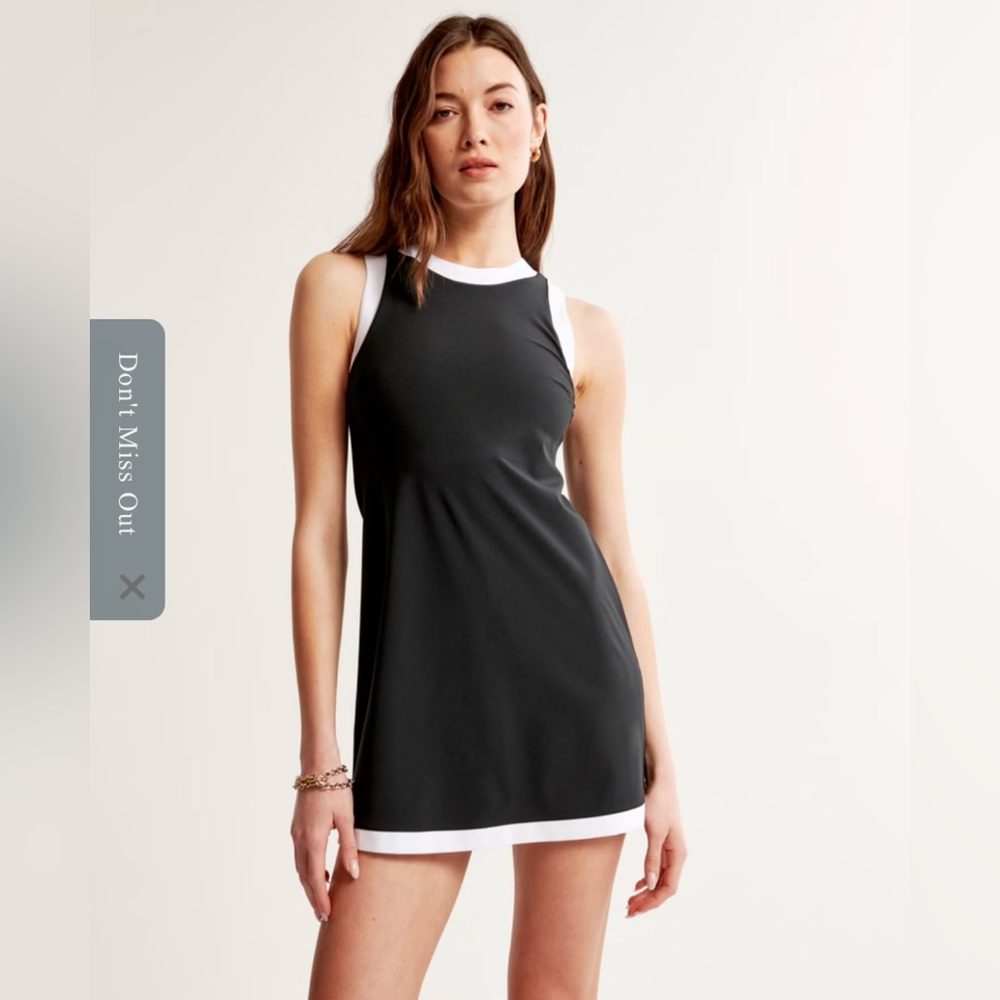Women's High-Neck Traveler Mini
Dress Abercrombie & Fitch
